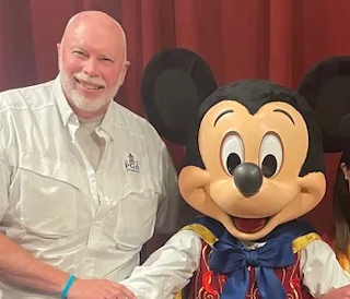 With Mickey Mouse